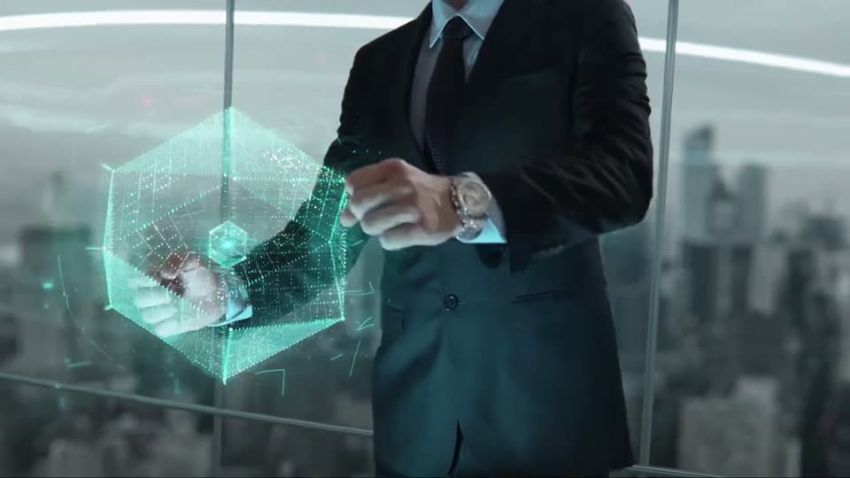 A consultant turning a cube of data in the air